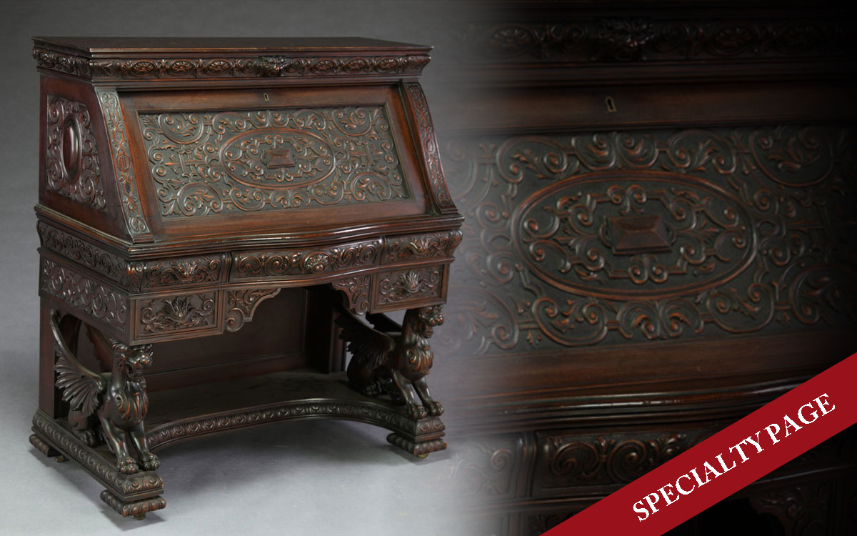A FINE R.J. HORNER CARVED MAHOGANY SLANT LID DESK WITH GRYPHON CARVINGS