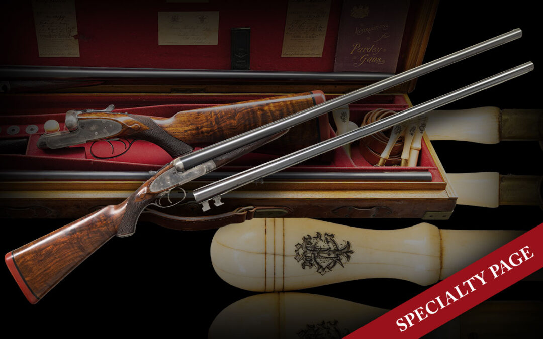 J. PURDEY NO. 13079 A SIDELOCK PIGEON GUN WITH 2 SETS OF BARRELS & MINIMAL ENGRAVING IN ORIGINAL CASE WITH FANCY MONOGRAMED ACCESSORIES & FACTORY LETTERS